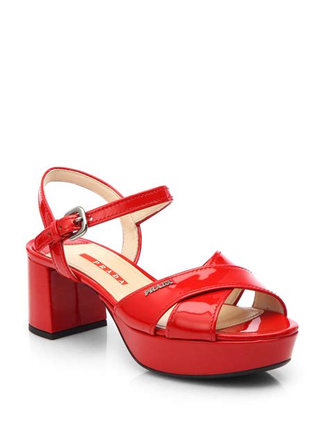 prada platforms with red pattened leather tops|Prada leather sandals.